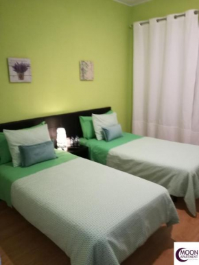 Отель Moon City Center Apartment  Atiães